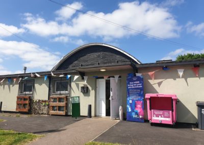 Temple Hill Community Centre, Dartford, hosting the repair event with e-waste bin and e-Waste Warriors banner oustide
