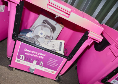 e-waste bin with electricals in it